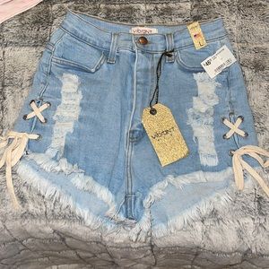 HIGH WAISTED TIE UP DENIM SHORTS